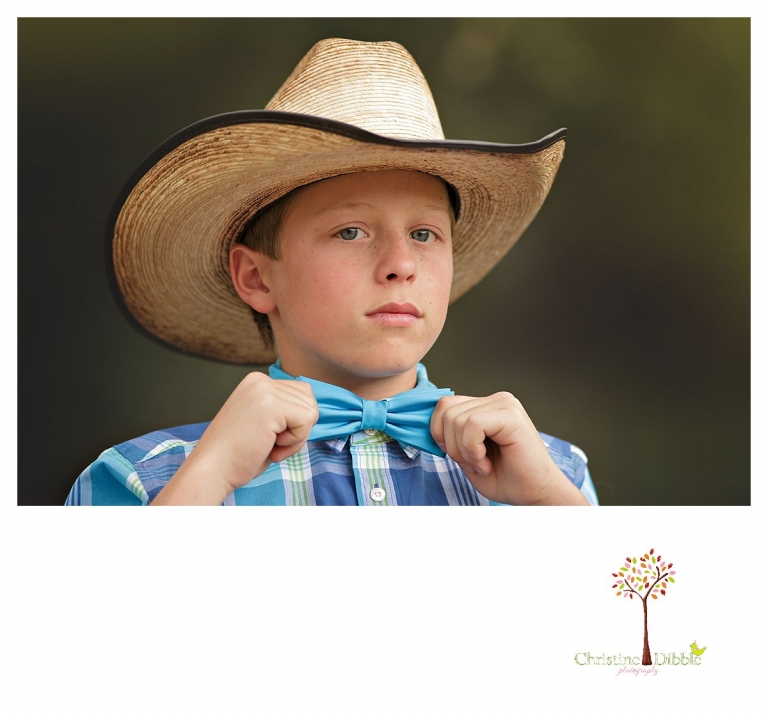 Sonora graduation and senior portrait photographer Christine Dibble Photography takes eighth grade graduation photos of a cowboy in his graduation clothes before the Curtis Creek School graduation.