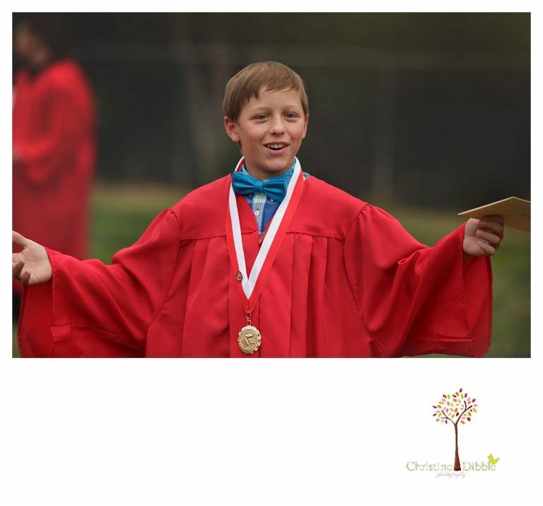 Sonora graduation and senior portrait photographer Christine Dibble Photography takes eighth grade graduation photos of a boy after the ceremony as he greets friends.
