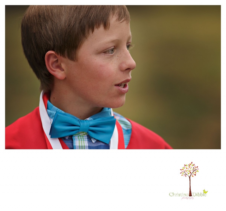 Sonora graduation and senior portrait photographer Christine Dibble Photography takes eighth grade graduation photos of a boy after his graduation from eighth grade.