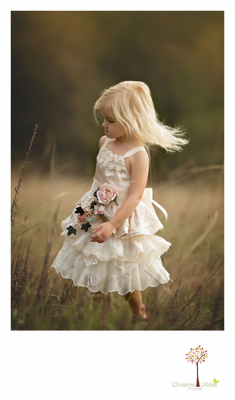 Sonora child photographer Christine Dibble Photography takes photos of flower girl dresses for Hopefully Romantic.