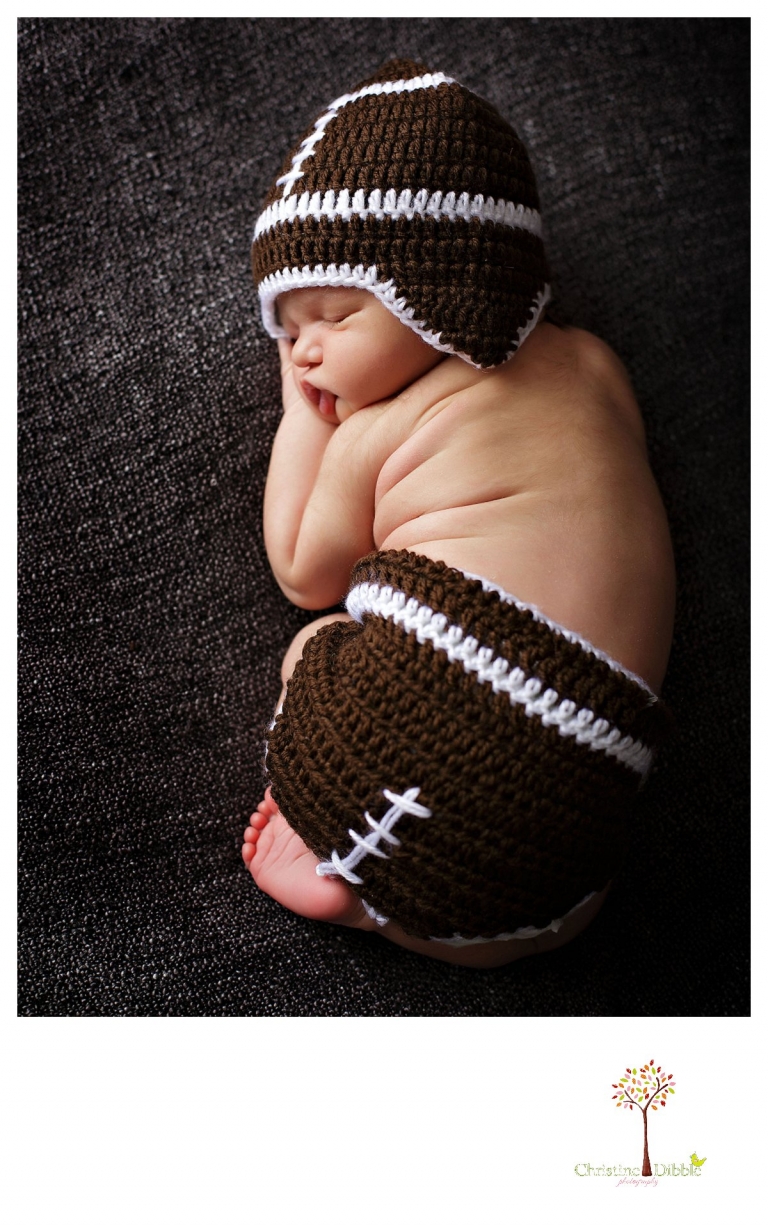 Newborn photography by best Sonora newborn photographer Christine Dibble Photography takes studio portraits of a future football player.