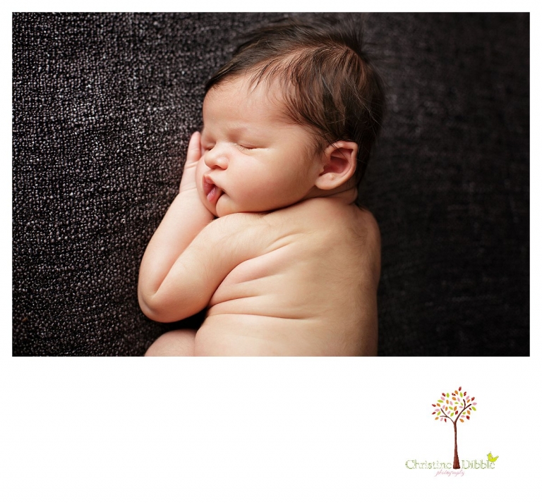 Newborn photography by best Sonora newborn photographer Christine Dibble Photography takes studio portraits of a sleepy newborn's squishy lips.