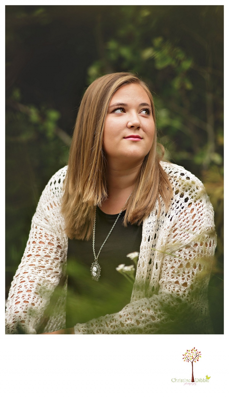 Sonora and Summerville senior portrait photographer Christine Dibble Photography takes outdoor senior portraits of a girl in a wooded area.