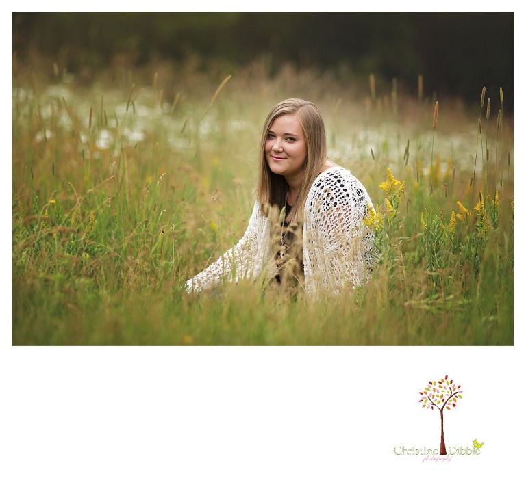 Sonora and Summerville senior portrait photographer Christine Dibble Photography takes outdoor senior portraits of a girl in a field of Yarrow.