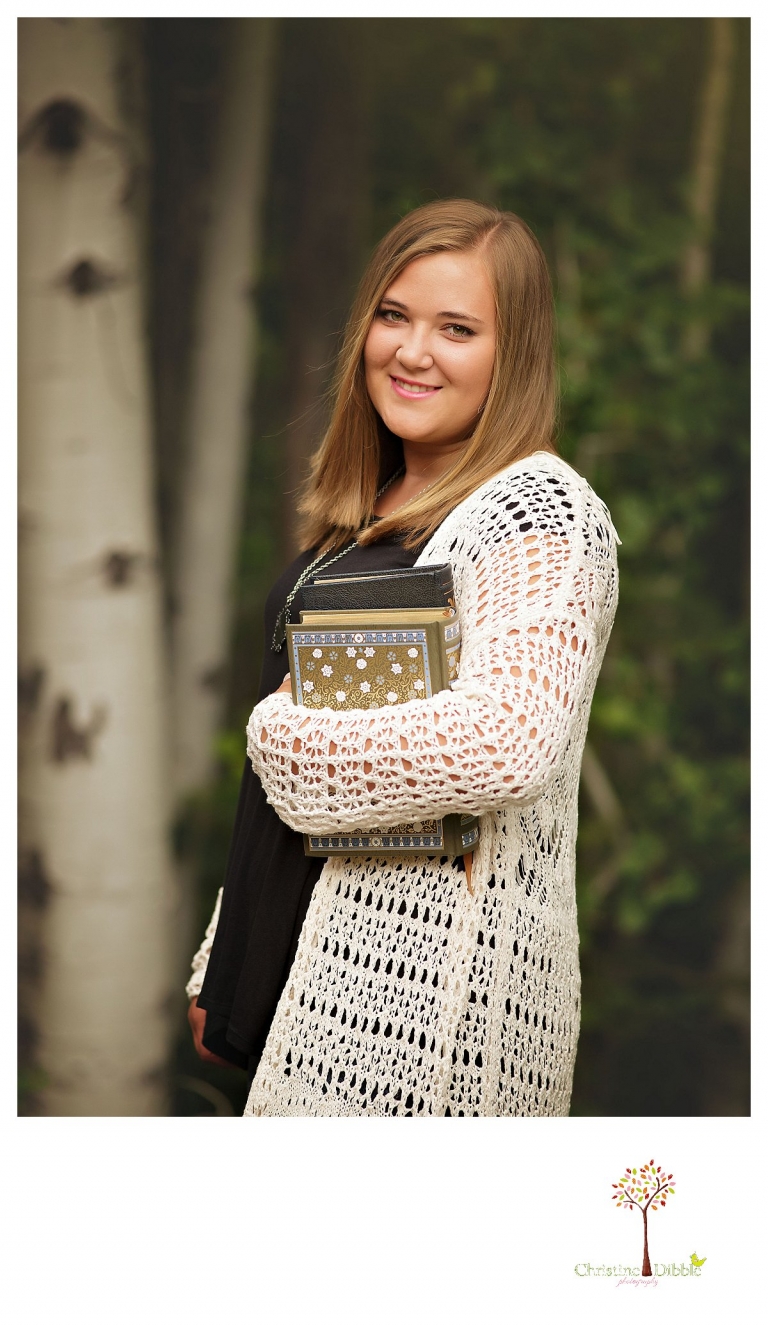 Sonora and Summerville senior portrait photographer Christine Dibble Photography takes outdoor senior portraits of a girl among aspen trees.