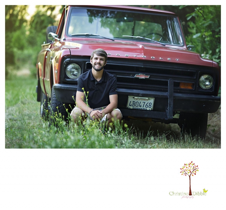 Sonora and Summerville senior portrait photographer Christine Dibble Photography takes senior portraits of a boy at Twain Harte Tree Farm with his beloved heirloom truck.
