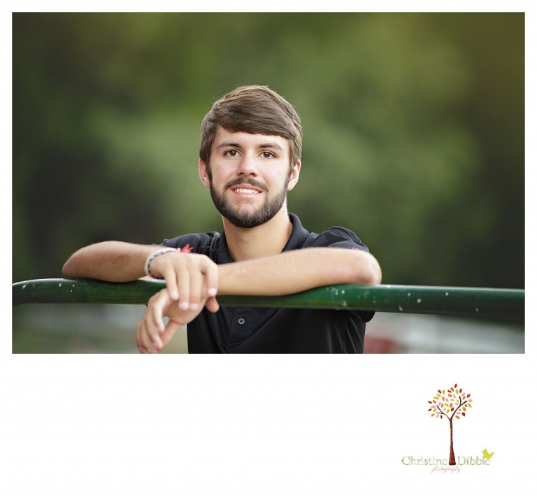 Sonora and Summerville senior portrait photographer Christine Dibble Photography takes senior portraits of a boy at Twain Harte Tree Farm out of Sonora.