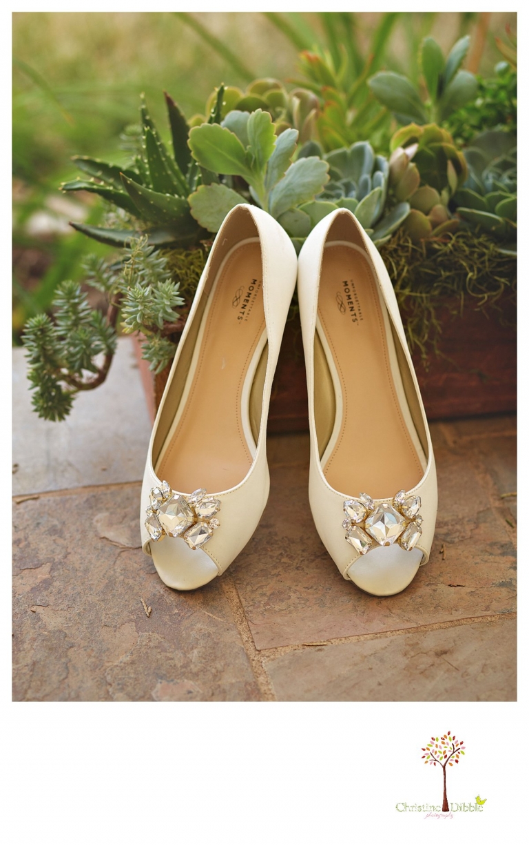 Wedding photography in Sonora by Christine Dibble Photography photographs the bride's shoes.