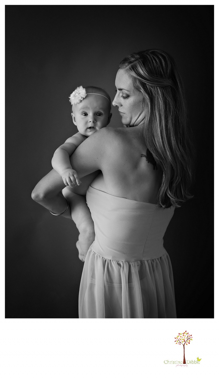 Sonora baby photographer Christine Dibble Photography takes studio portraits for a mommy and me session in black and white.
