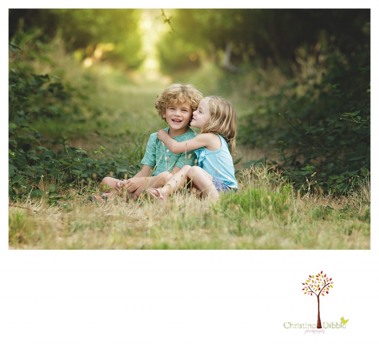 Sonora family photographer Christine Dibble Photography takes glowing sibling photos with a dreamy quality.