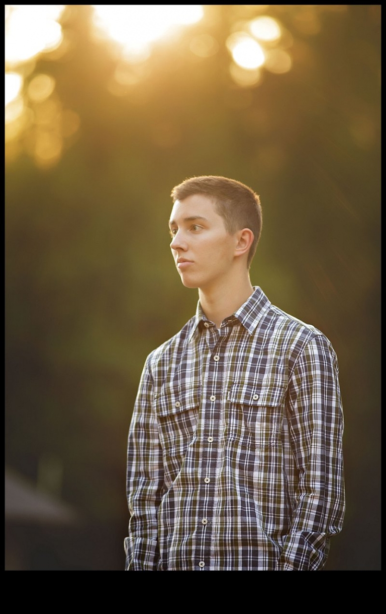 During a senior portrait session with Christine Dibble Photography of Sonora, a Summerville Bear looks off into the hazy evening sunlight.