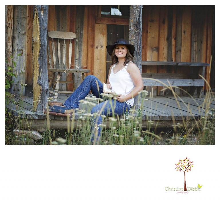 Senior portraits in Sonora taken of a Summerville Class of 2016 senior by Christine Dibble Photography on a rustic wooden porch with weathered walls.