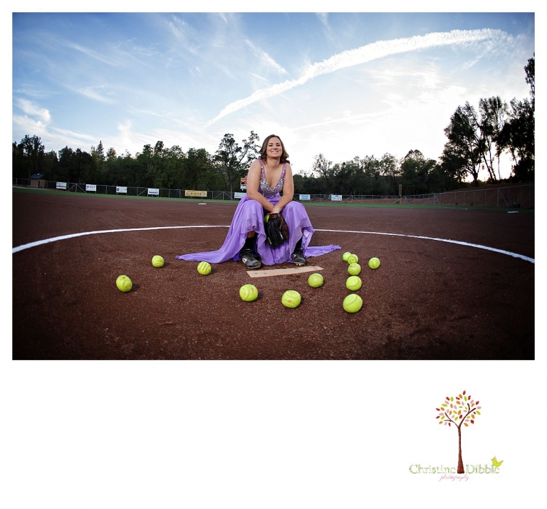 Summerville and Sonora senior portrait photographer Christine Dibble Photoraphy takes a fisheye portrait of a pitcher on the mound in a formal dress.