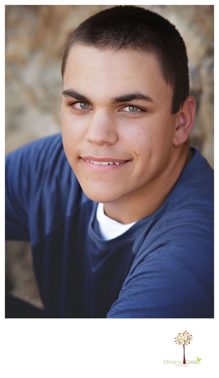 Summerville senior portrait photographer, Christine Dibble Photography of Sonora, takes photos of a senior boy at Knights Ferry.