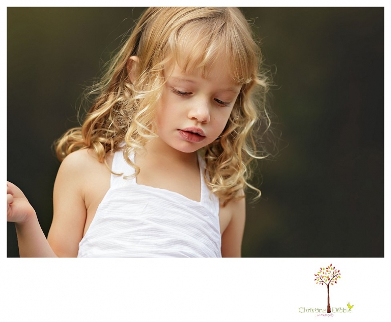 Sonora family photographer Christine Dibble Photography takes photos at a family portrait session at Twain Harte Tree Farm.