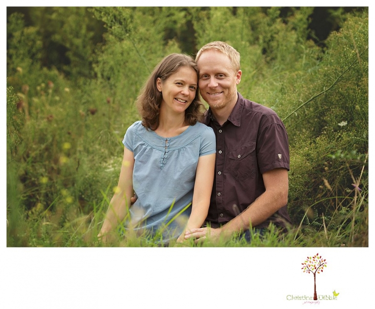 Sonora family portrait photographer Christine Dibble Photography takes family photos on a rainy day at Indigeny Reserve as a family plays in the orchards and corn field.