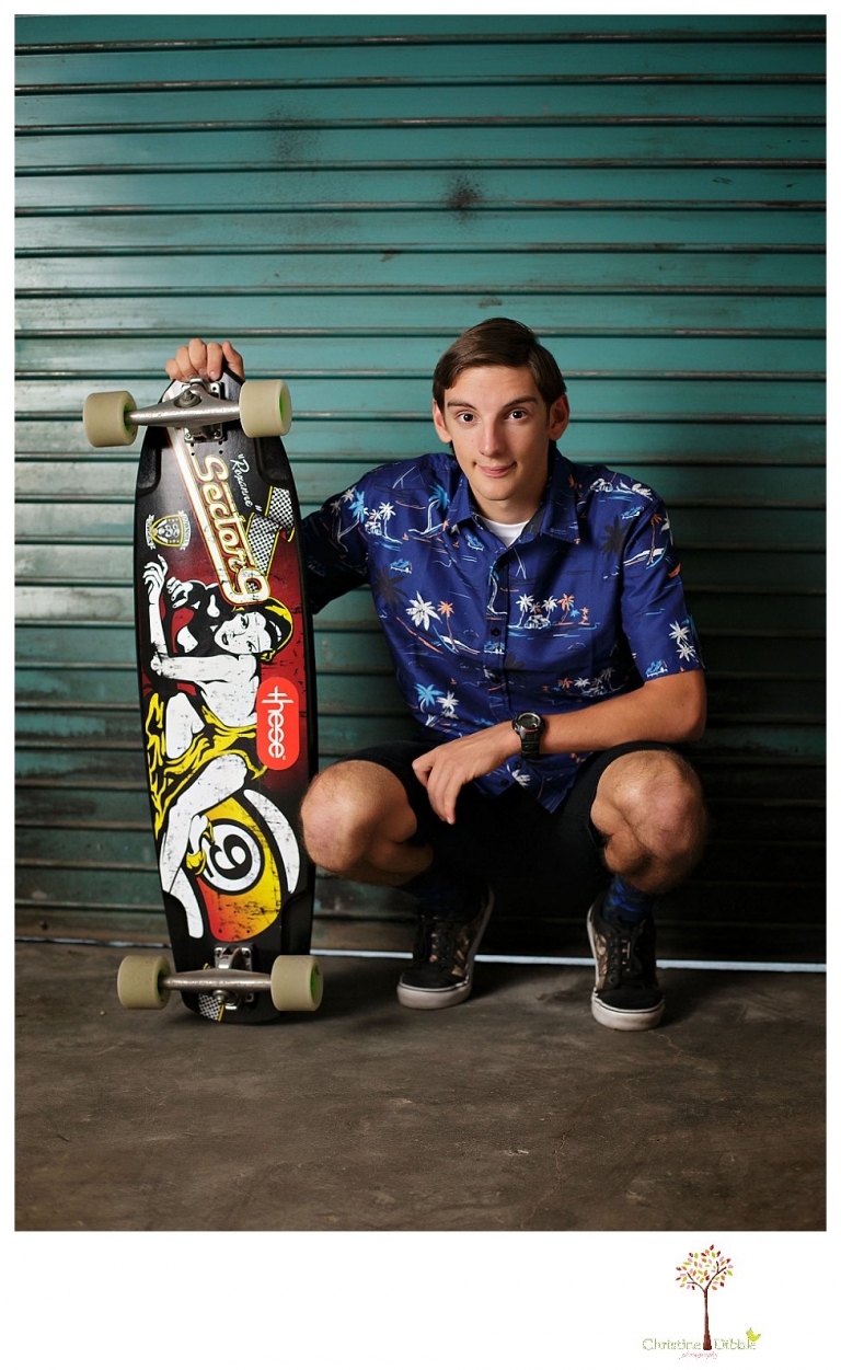 Summerville High and Sonora senior portrait photographer Christine Dibble Photography takes studio senior portraits of a boy and his skateboard.
