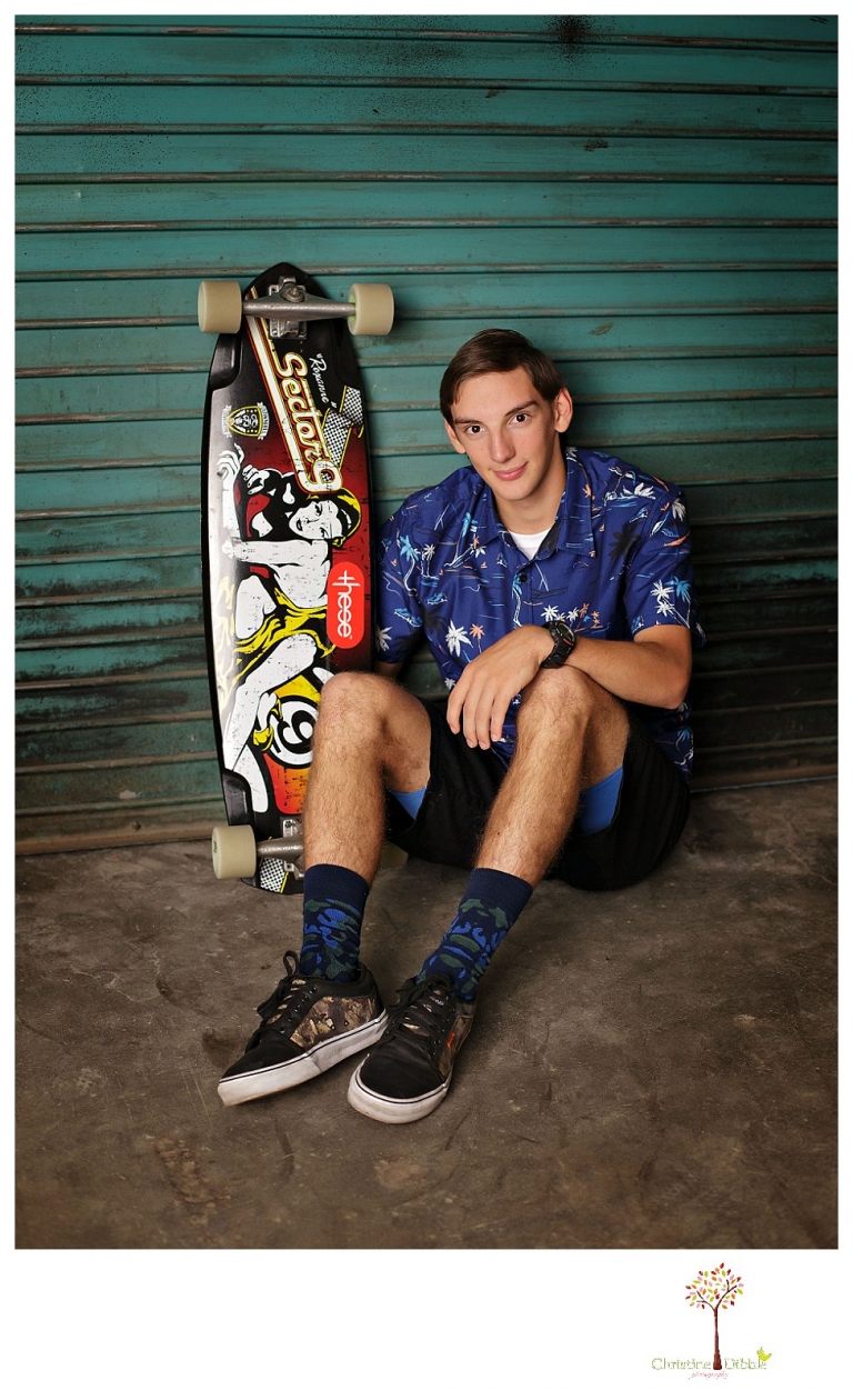 Summerville High and Sonora senior portrait photographer Christine Dibble Photography takes studio senior portraits of a boy and his skateboard.
