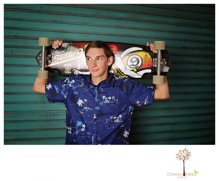 Summerville High and Sonora senior portrait photographer Christine Dibble Photography takes studio senior portraits of a boy and his skateboard.