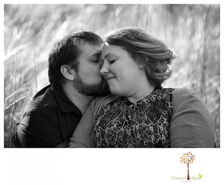 Sonora engagement and couple's portrait photographer Christine Dibble Photography takes photos of couples laughing, kissing, cuddling and having fun outdoors in golden sunlight.