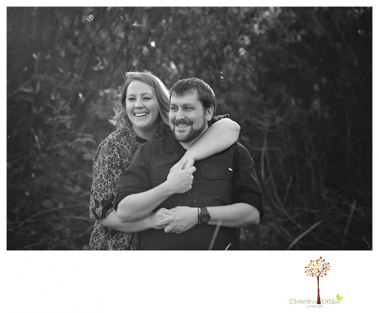Sonora engagement and couple's portrait photographer Christine Dibble Photography takes photos of couples laughing, kissing, cuddling and having fun outdoors in golden sunlight.