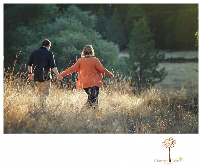 Sonora engagement and couple's portrait photographer Christine Dibble Photography takes photos of couples laughing, kissing, cuddling and having fun outdoors in golden sunlight.
