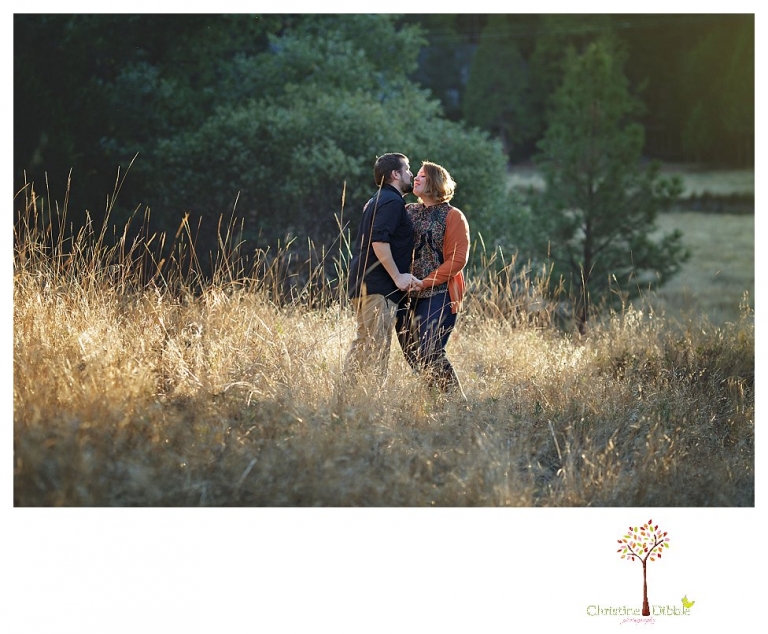 Sonora engagement and couple's portrait photographer Christine Dibble Photography takes photos of couples laughing, kissing, cuddling and having fun outdoors in golden sunlight.