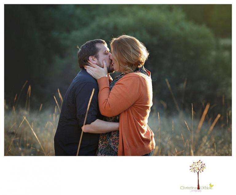 Sonora engagement and couple's portrait photographer Christine Dibble Photography takes photos of couples laughing, kissing, cuddling and having fun outdoors in golden sunlight.