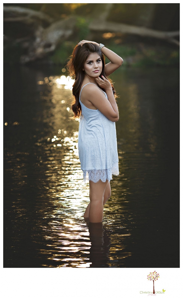 Sonora senior portrait photographer Christine Dibble Photography takes senior portraits of a beautiful Gustine High School Class of 2016 senior at Knights Ferry as she wades in the water.