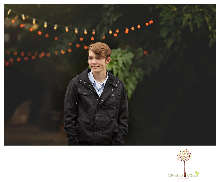 Sonora High senior portrait photographer Christine Dibble Photography photographs a senior boy in downtown Sonora with his guitar and in his Golden Regiment Band drum major uniform.