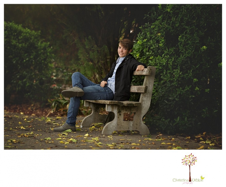 Sonora High senior portrait photographer Christine Dibble Photography photographs a senior boy in downtown Sonora with his guitar and in his Golden Regiment Band drum major uniform.