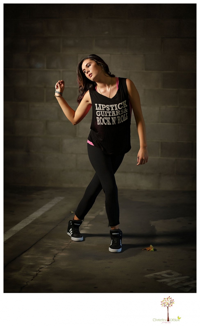 Sonora photographer Christine Dibble Photography takes a Summerville High senior's portraits in the downtown Sonora parking garage with a dance inspired theme.