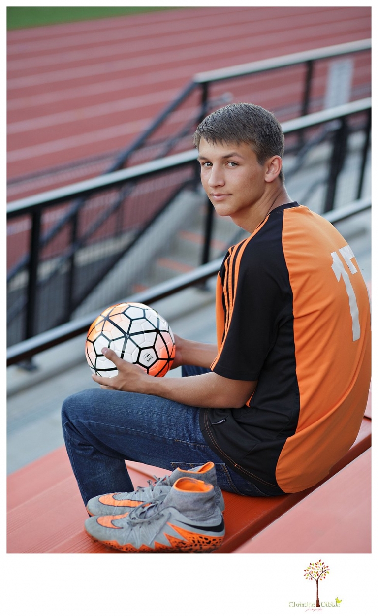 Summerville senior portrait photographer, Christine Dibble Photography of Sonora takes senior portraits of a senior boy in casual and dress clothes and in his soccer uniform on the Summerville soccer field.