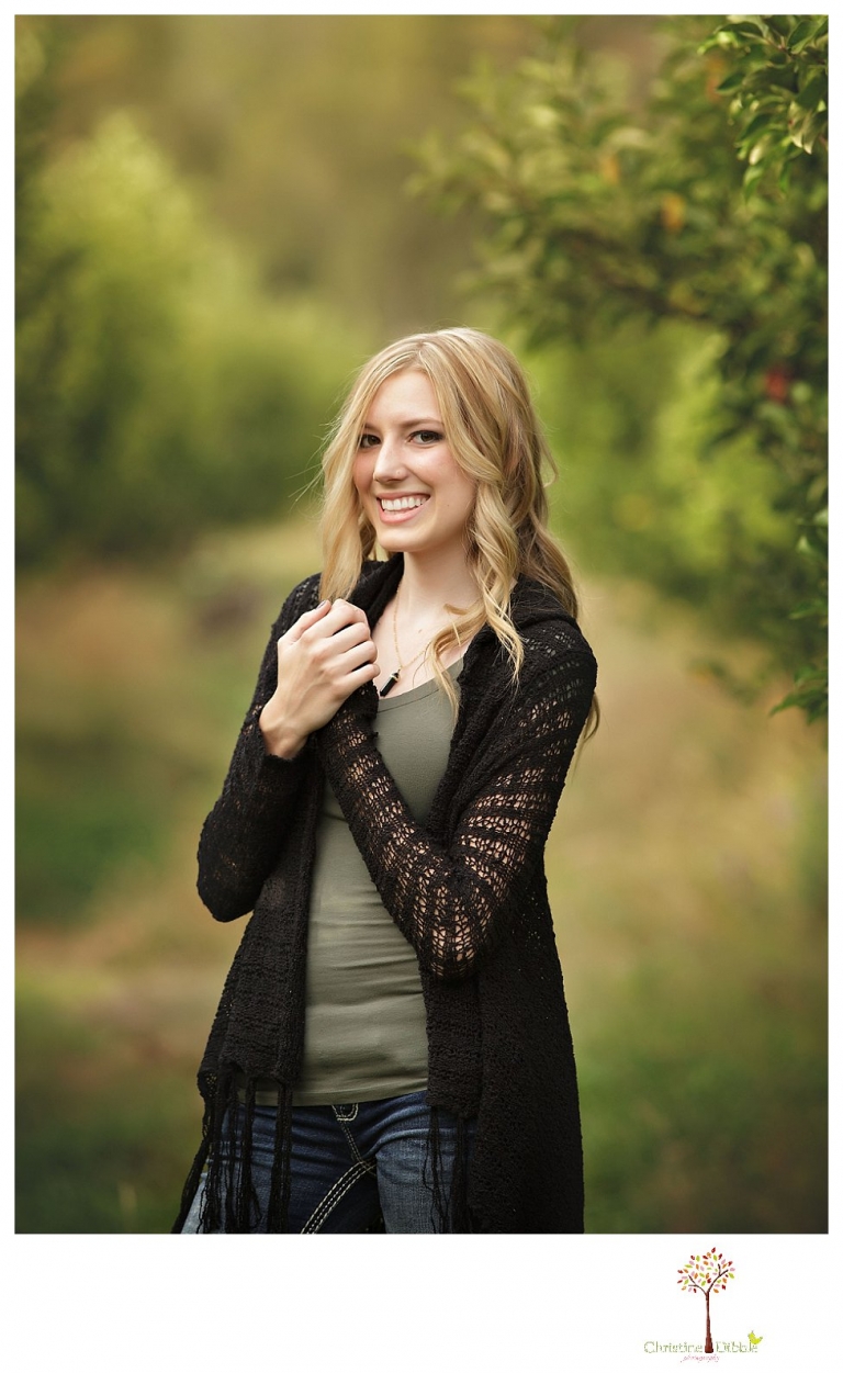 Sonora photographer Christine Dibble Photography takes Summerville senior portraits of a senior girl in the fall outside at Indigeny Reserve.