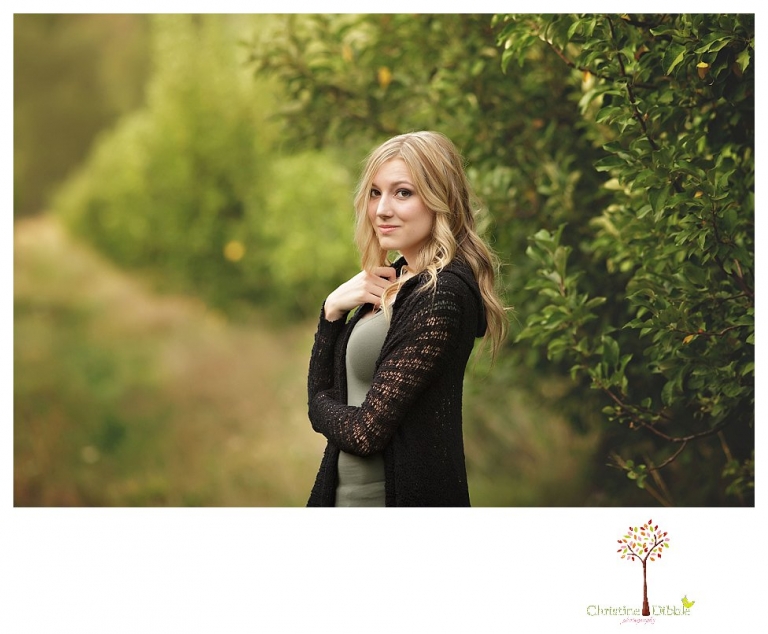 Sonora photographer Christine Dibble Photography takes Summerville senior portraits of a senior girl in the fall outside at Indigeny Reserve.