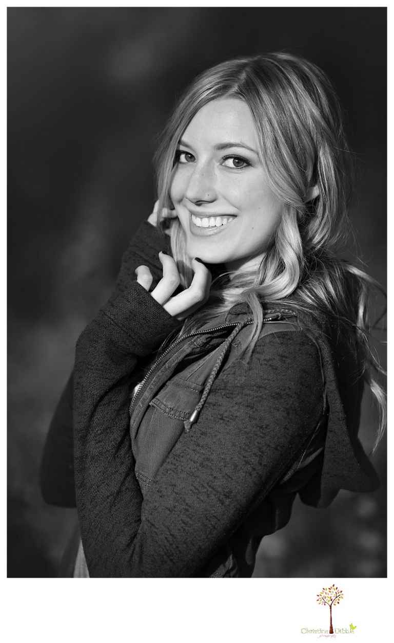 Sonora photographer Christine Dibble Photography takes Summerville senior portraits of a senior girl in the fall outside at Indigeny Reserve.