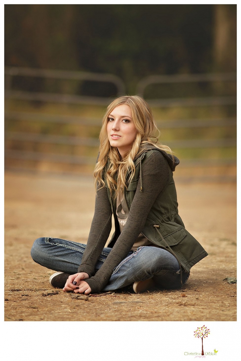 Sonora photographer Christine Dibble Photography takes Summerville senior portraits of a senior girl in the fall outside at Indigeny Reserve.