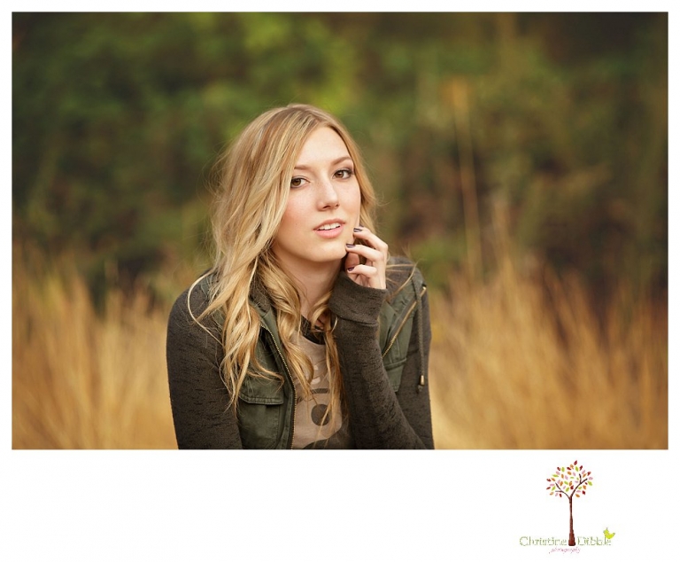 Sonora photographer Christine Dibble Photography takes Summerville senior portraits of a senior girl in the fall outside at Indigeny Reserve.
