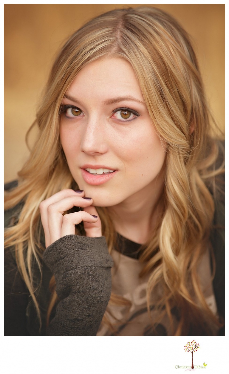 Sonora photographer Christine Dibble Photography takes Summerville senior portraits of a senior girl in the fall outside at Indigeny Reserve.