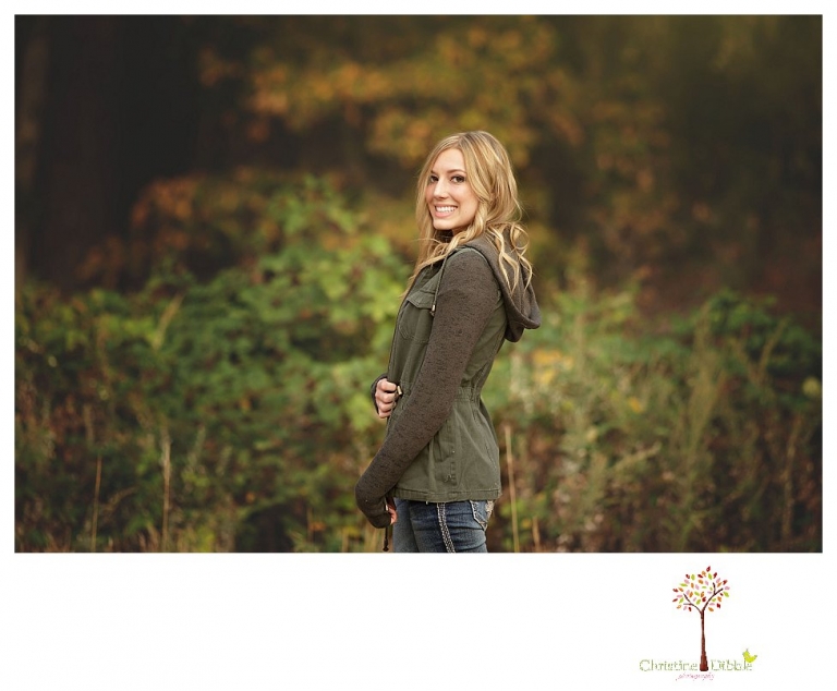 Sonora photographer Christine Dibble Photography takes Summerville senior portraits of a senior girl in the fall outside at Indigeny Reserve.
