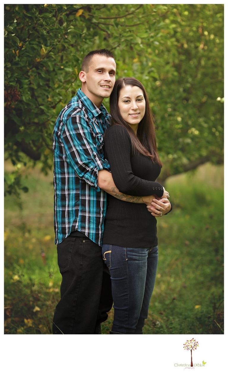 Sonora engagement and wedding photographer Christine Dibble Photography takes engagement photos of a couple while the groom is on crutches for a broken foot and they both wear San Francisco Giants baseball shirts.