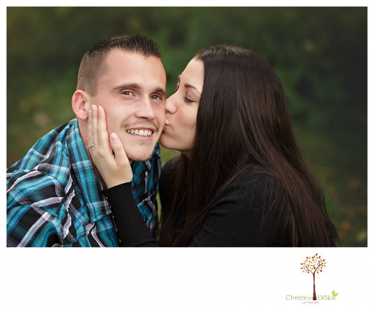 Sonora engagement and wedding photographer Christine Dibble Photography takes engagement photos of a couple while the groom is on crutches for a broken foot and they both wear San Francisco Giants baseball shirts.