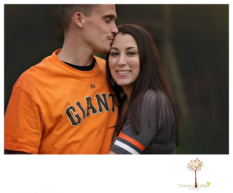 Sonora engagement and wedding photographer Christine Dibble Photography takes engagement photos of a couple while the groom is on crutches for a broken foot and they both wear San Francisco Giants baseball shirts.