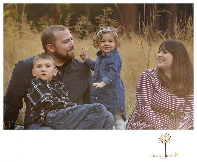 Sonora family photographer Christine Dibble Photography takes family portraits at Pinecrest Lake as the family plays in a field and then wears ugly sweaters for Christmas card photos.