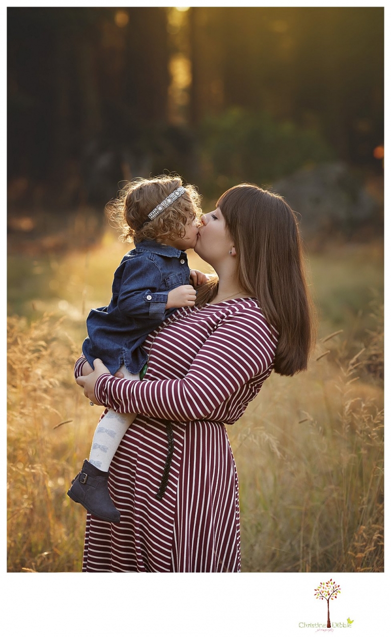 Sonora family photographer Christine Dibble Photography takes family portraits at Pinecrest Lake as the family plays in a field and then wears ugly sweaters for Christmas card photos.