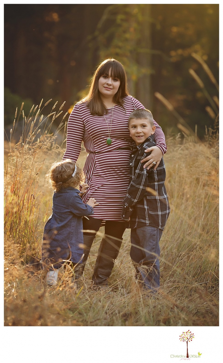 Sonora family photographer Christine Dibble Photography takes family portraits at Pinecrest Lake as the family plays in a field and then wears ugly sweaters for Christmas card photos.