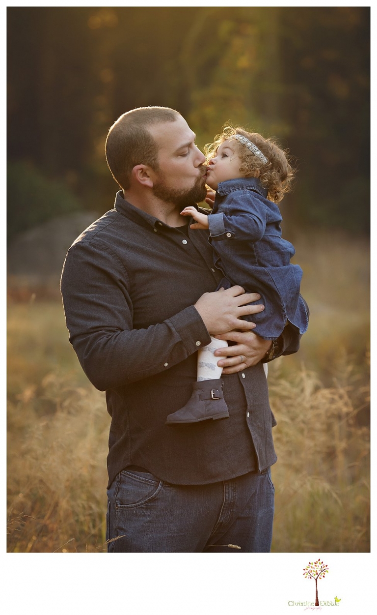 Sonora family photographer Christine Dibble Photography takes family portraits at Pinecrest Lake as the family plays in a field and then wears ugly sweaters for Christmas card photos.