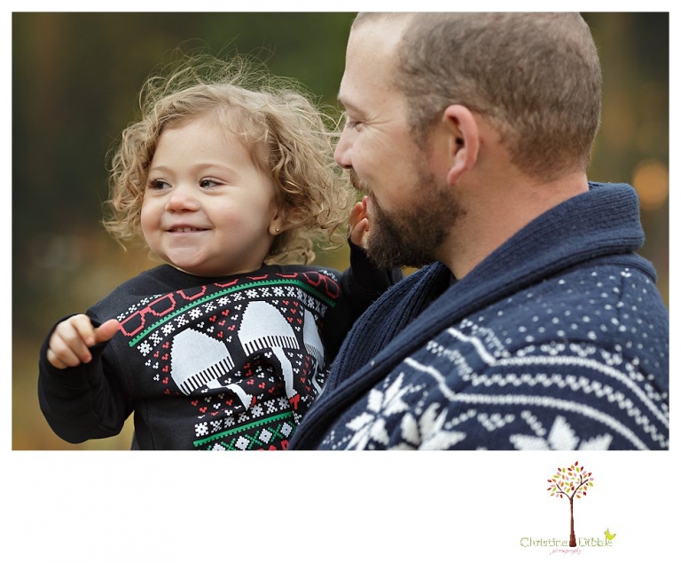 Sonora family photographer Christine Dibble Photography takes family portraits at Pinecrest Lake as the family plays in a field and then wears ugly sweaters for Christmas card photos.