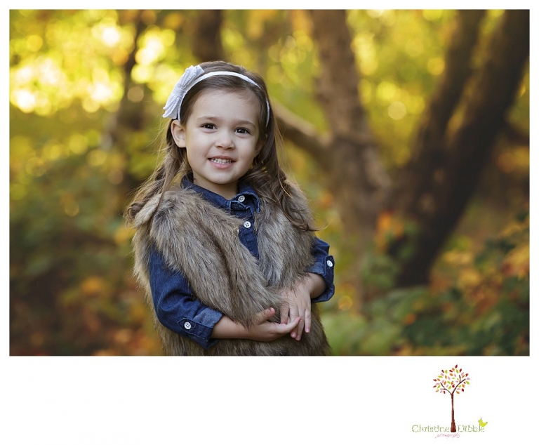 Sonora Family Photographer Christine Dibble Photography takes extended Fall family photos at Indigeny Reserve on a cream velvet loveseat sitting in the apple orchard.