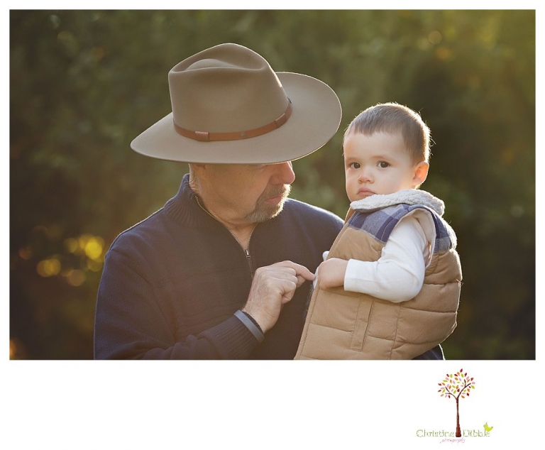 Sonora Family Photographer Christine Dibble Photography takes extended Fall family photos at Indigeny Reserve on a cream velvet loveseat sitting in the apple orchard.